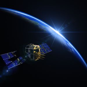 A satellite orbits in space, with Earth visible in the background